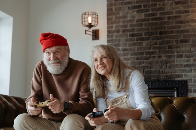 Grandparents playing video games